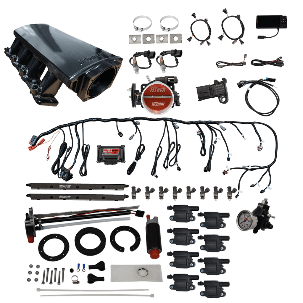 Car engine parts and wiring kit components.