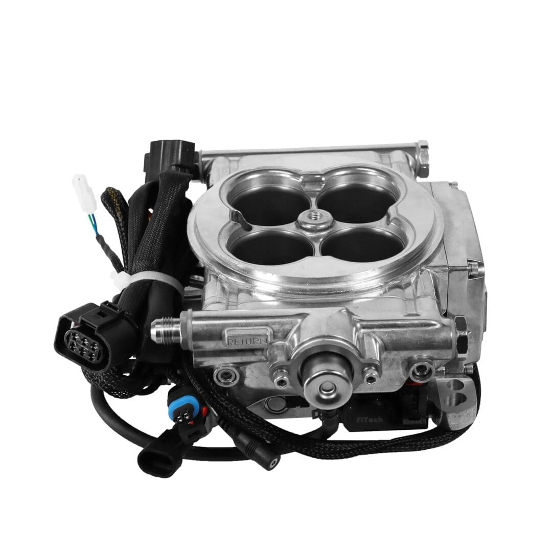 Car engine throttle body on white background.