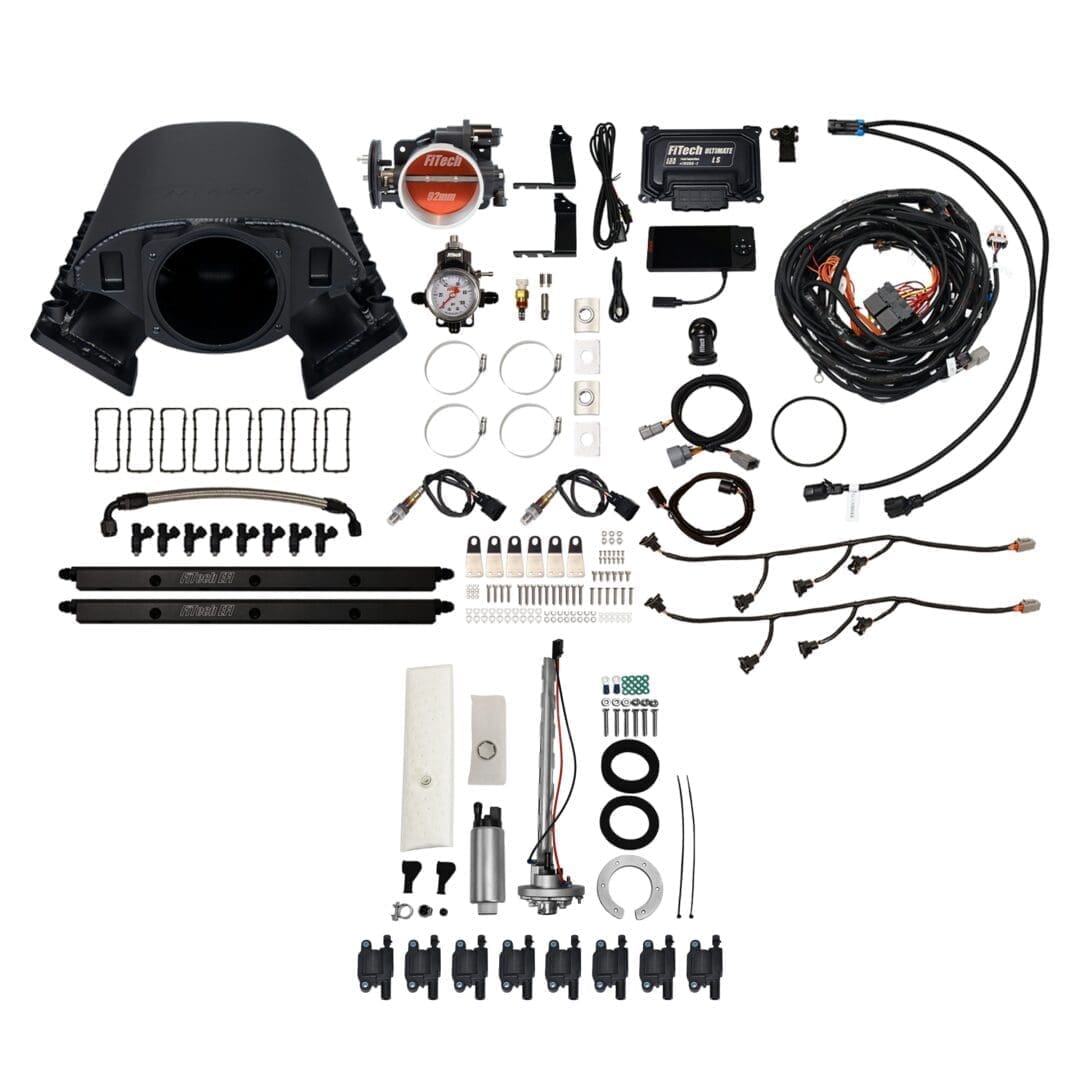 Car engine component kit with various parts.