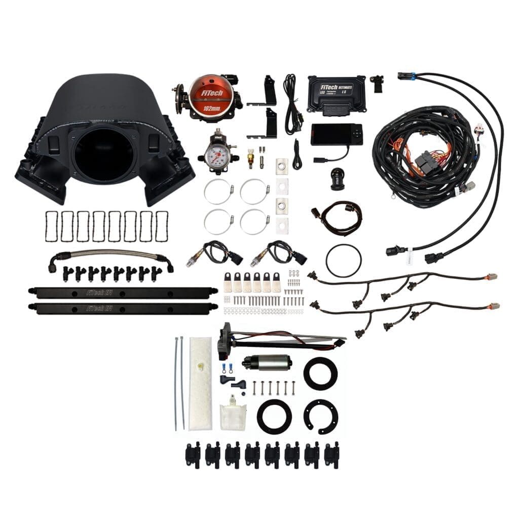 Automotive engine components and wiring kit layout.
