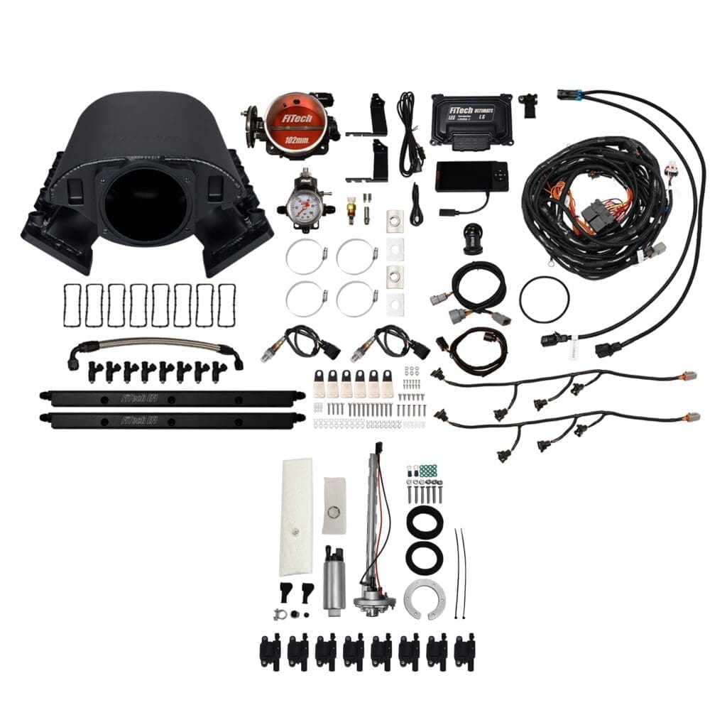 Car engine parts and wiring kit components.
