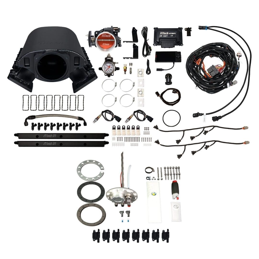Car engine component kit with various parts.