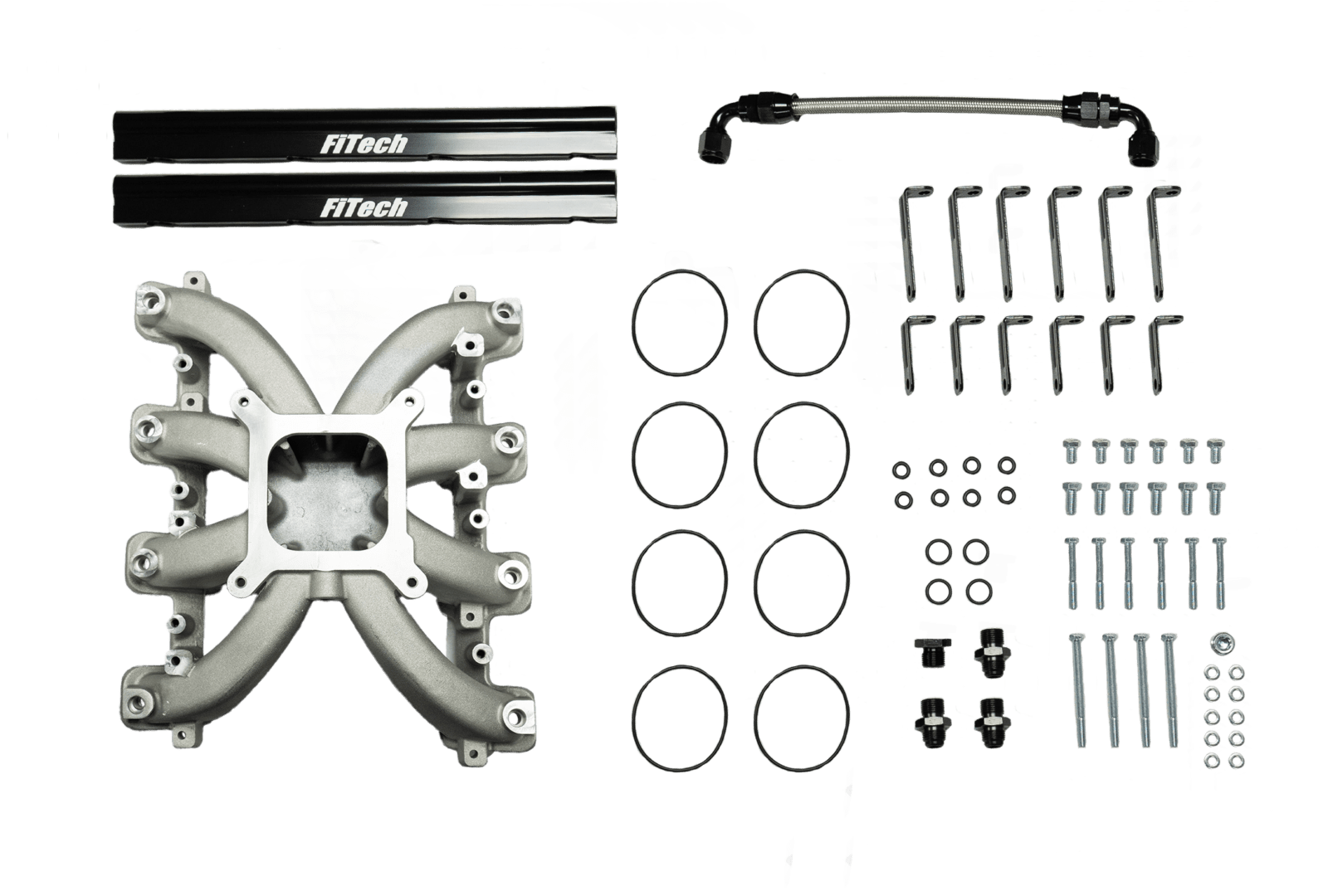 Car engine manifold and parts on display.