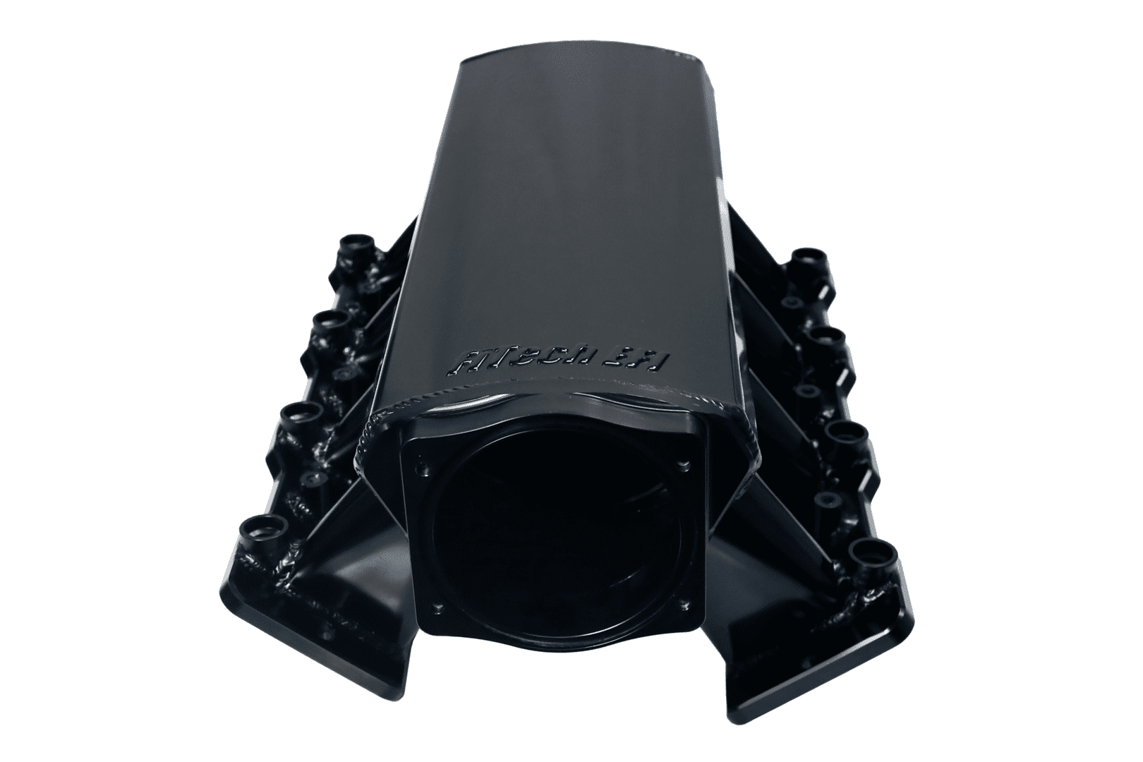 Black automotive engine intake manifold, isolated view.