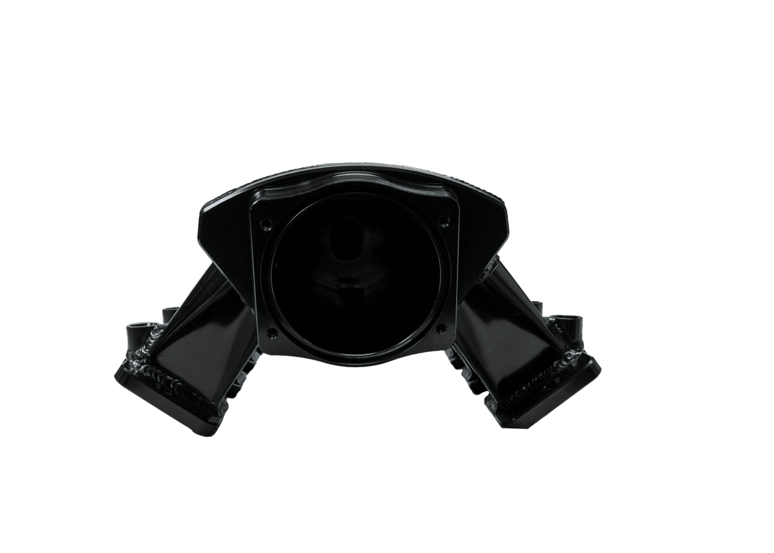 Black engine part against dark background.