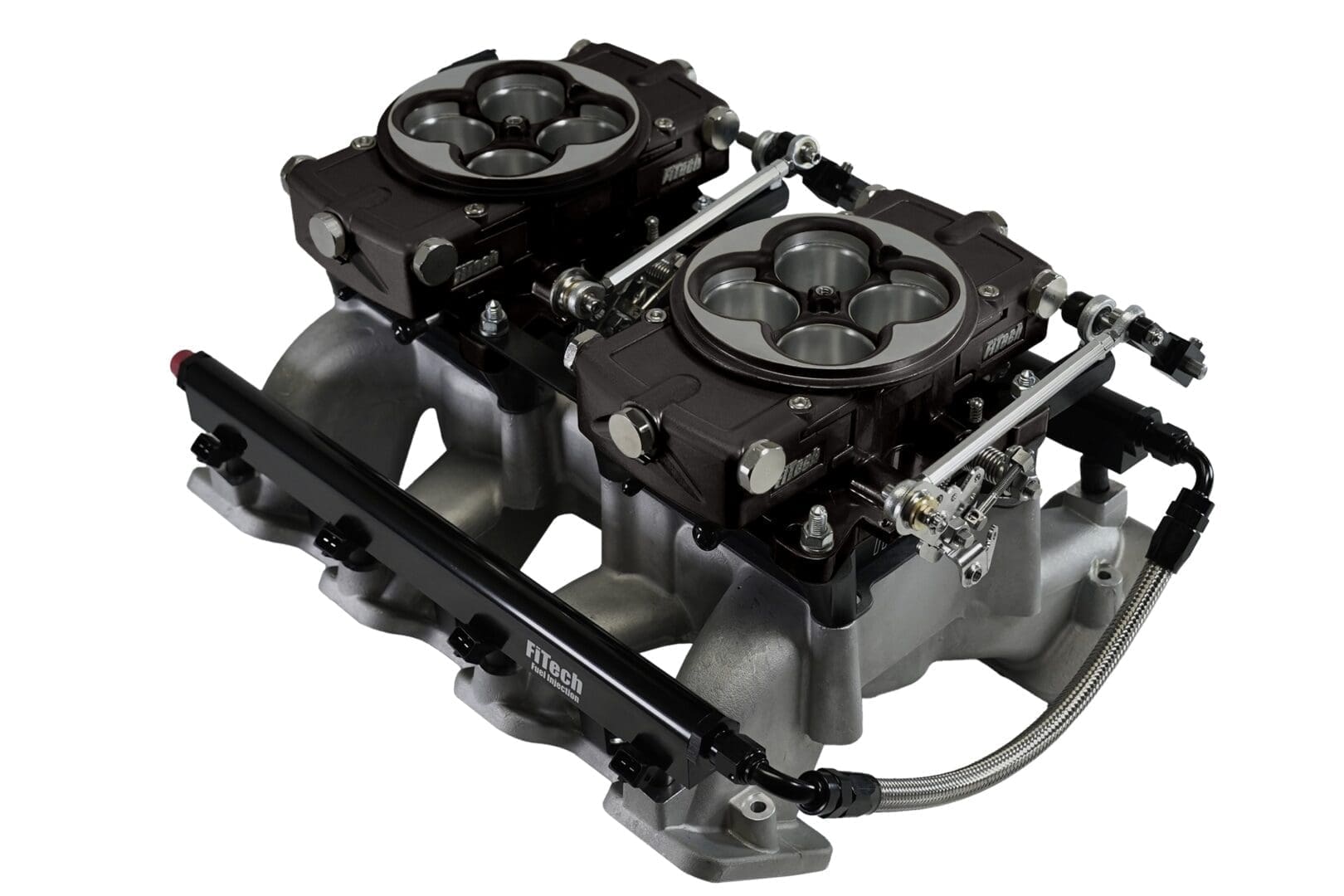 Dual carburetor setup on intake manifold.