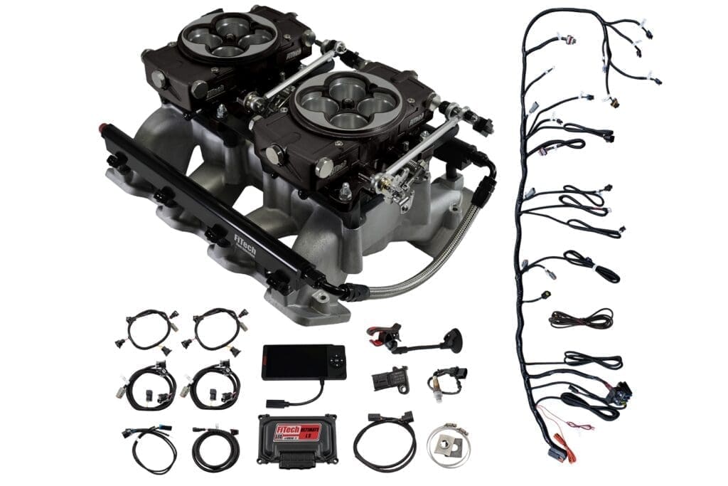 Car engine parts and wiring kit components.