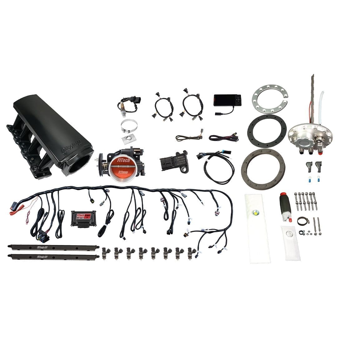 Electronic fuel injection kit components laid out.