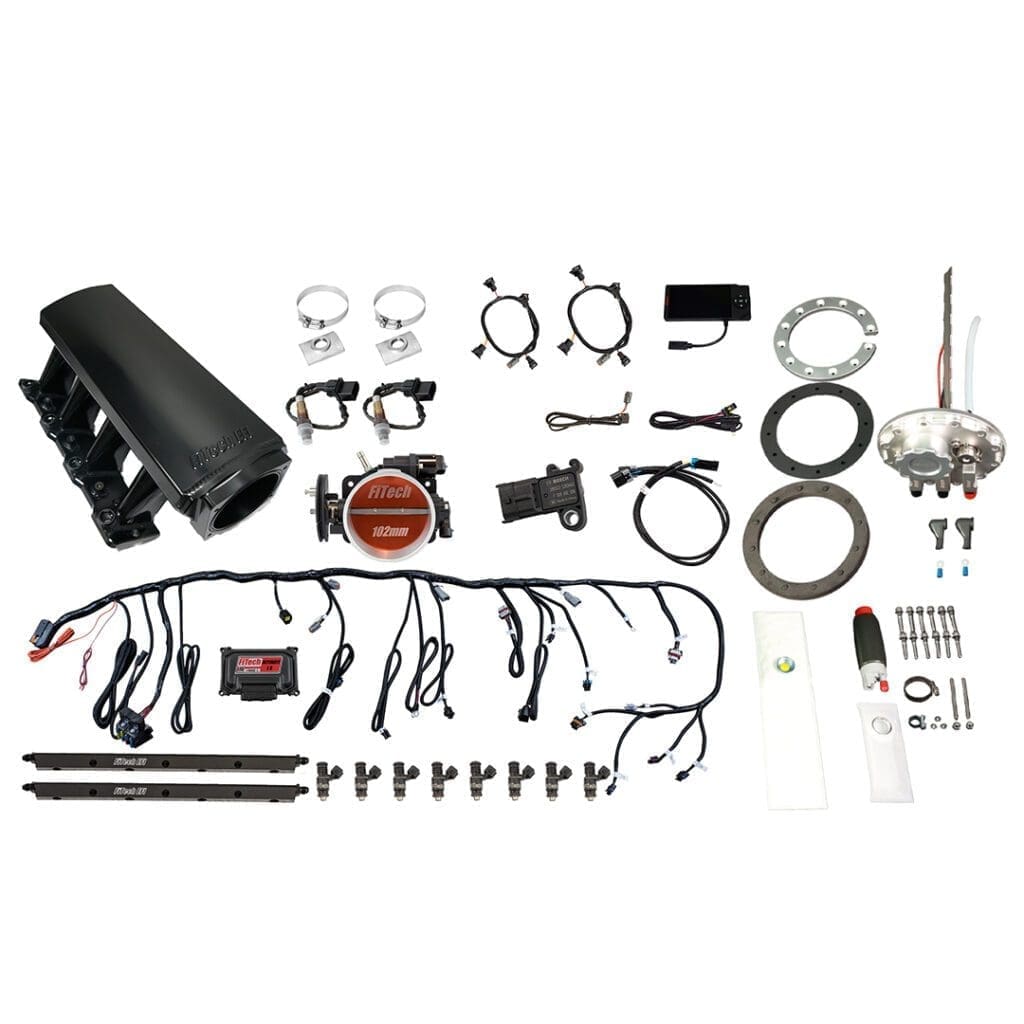 Car engine components and wiring kit displayed.