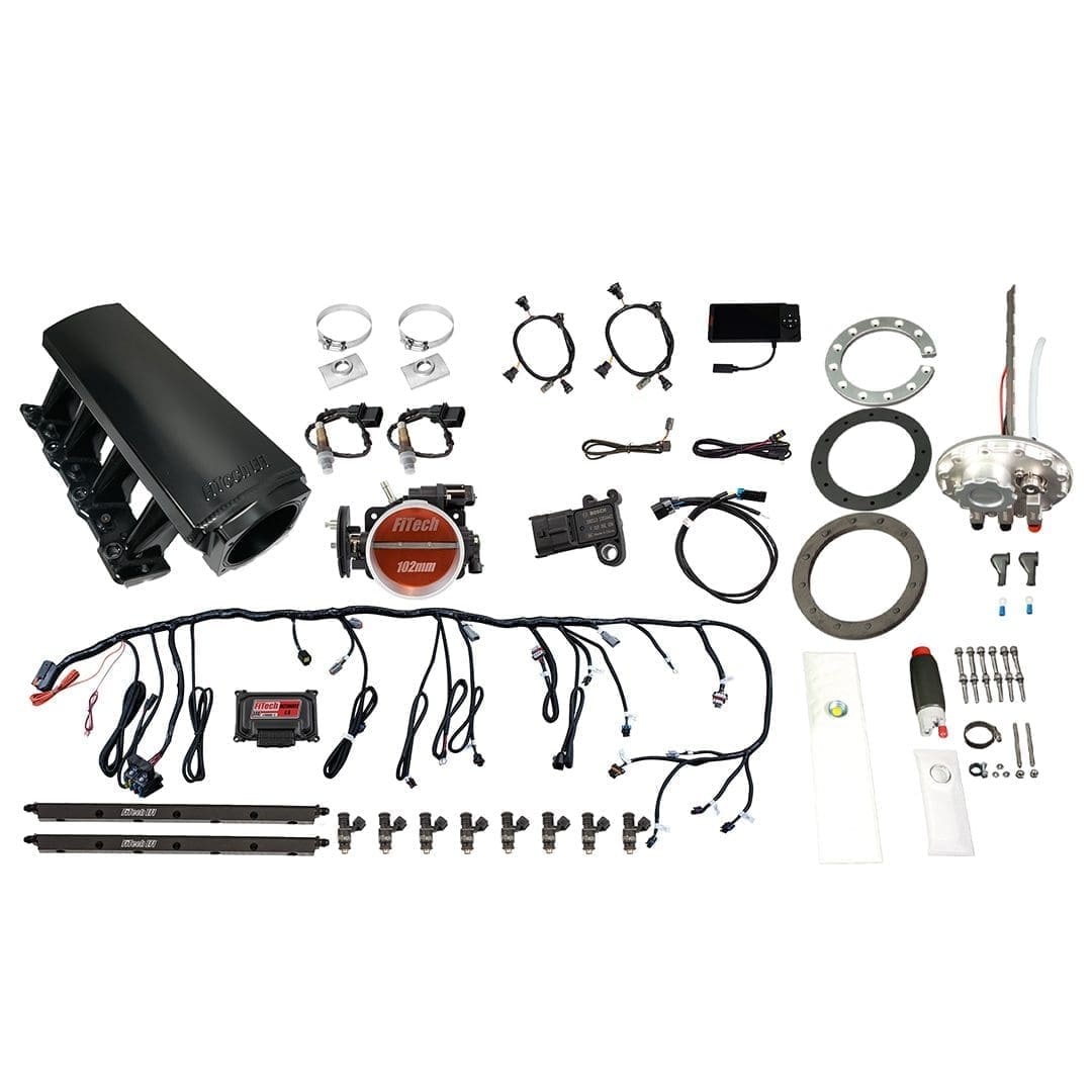 Car engine components and wiring kit displayed.