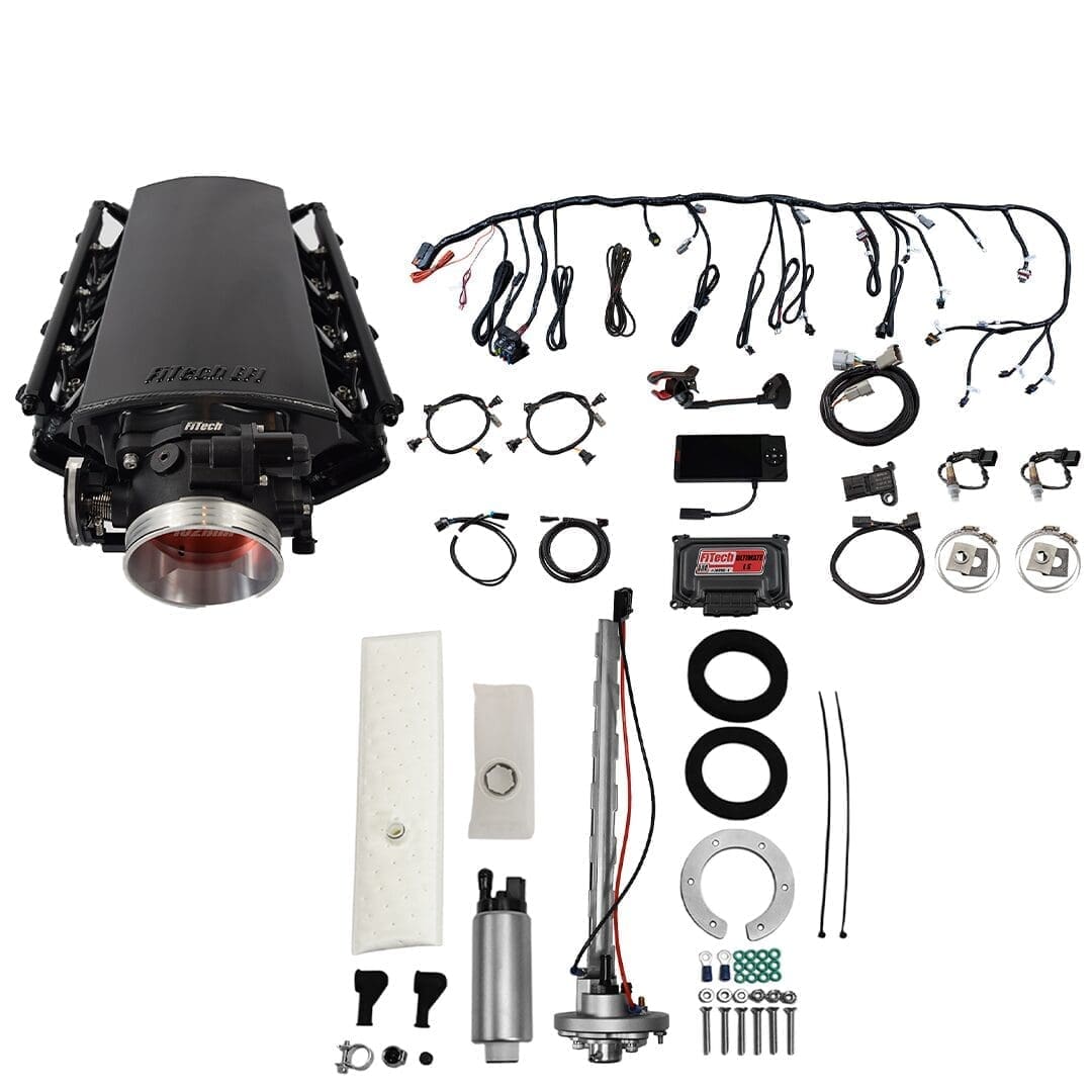 Car engine parts and wiring components displayed.