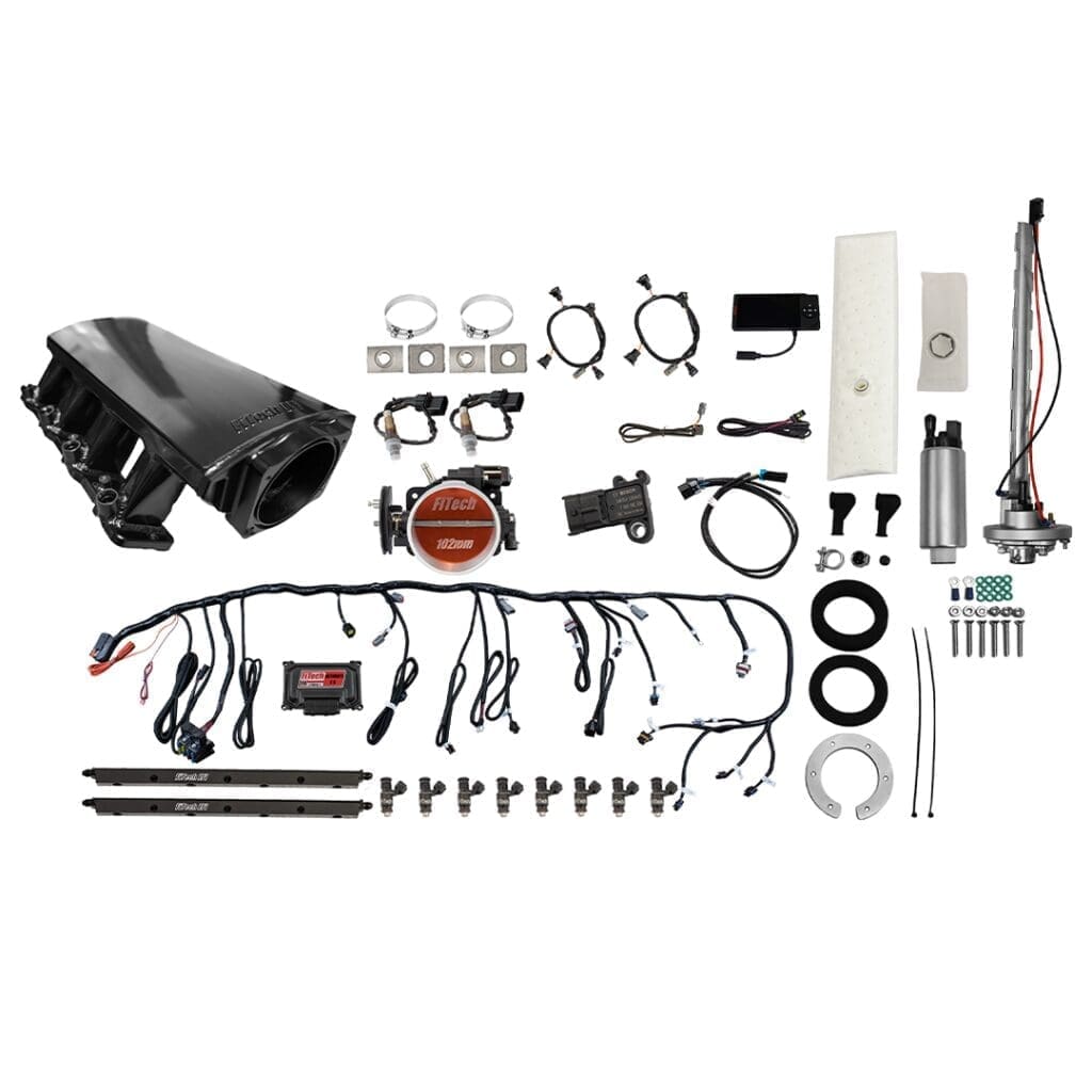 Car engine parts and wiring kit components.