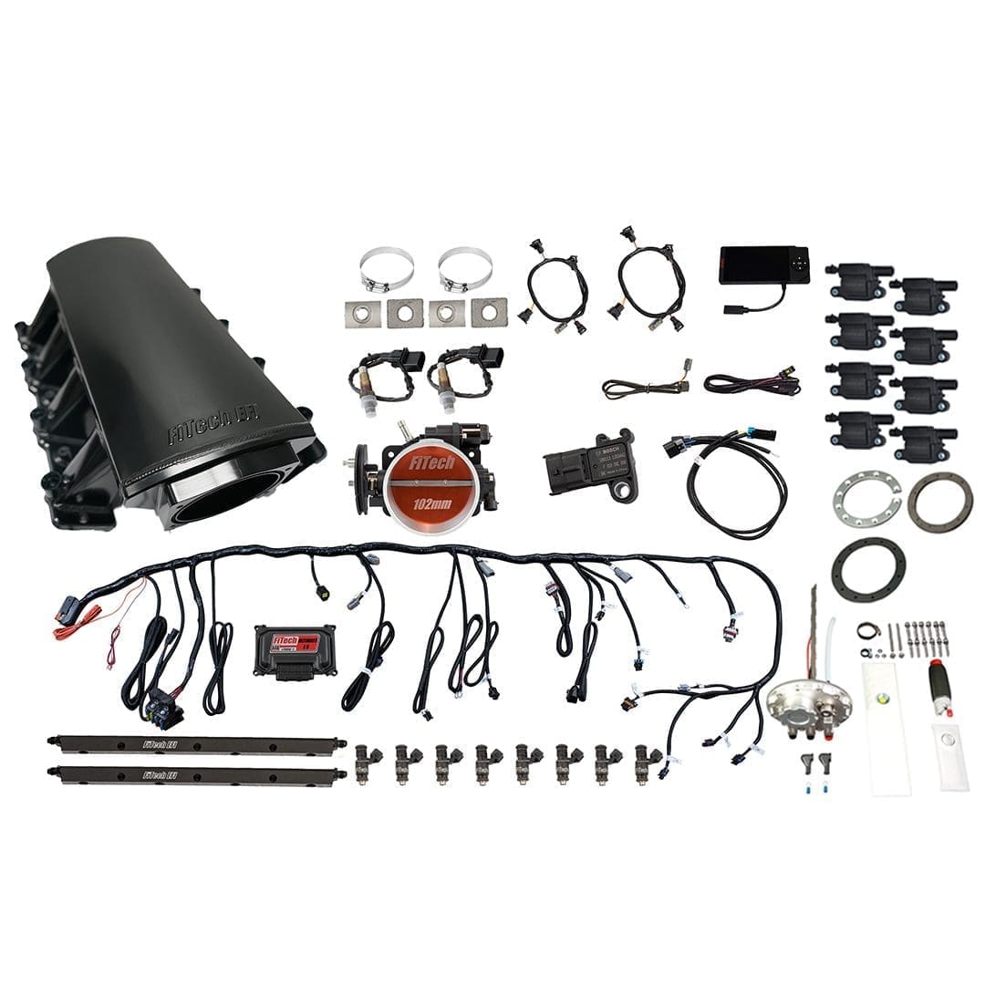 Car engine parts kit arranged neatly.