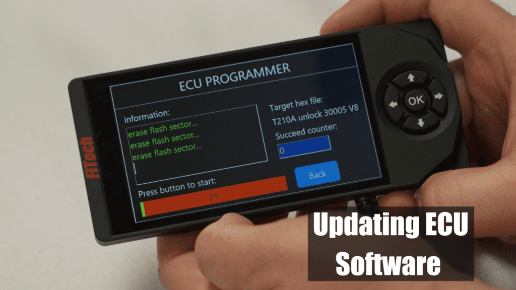 ECU programmer device updating software display.