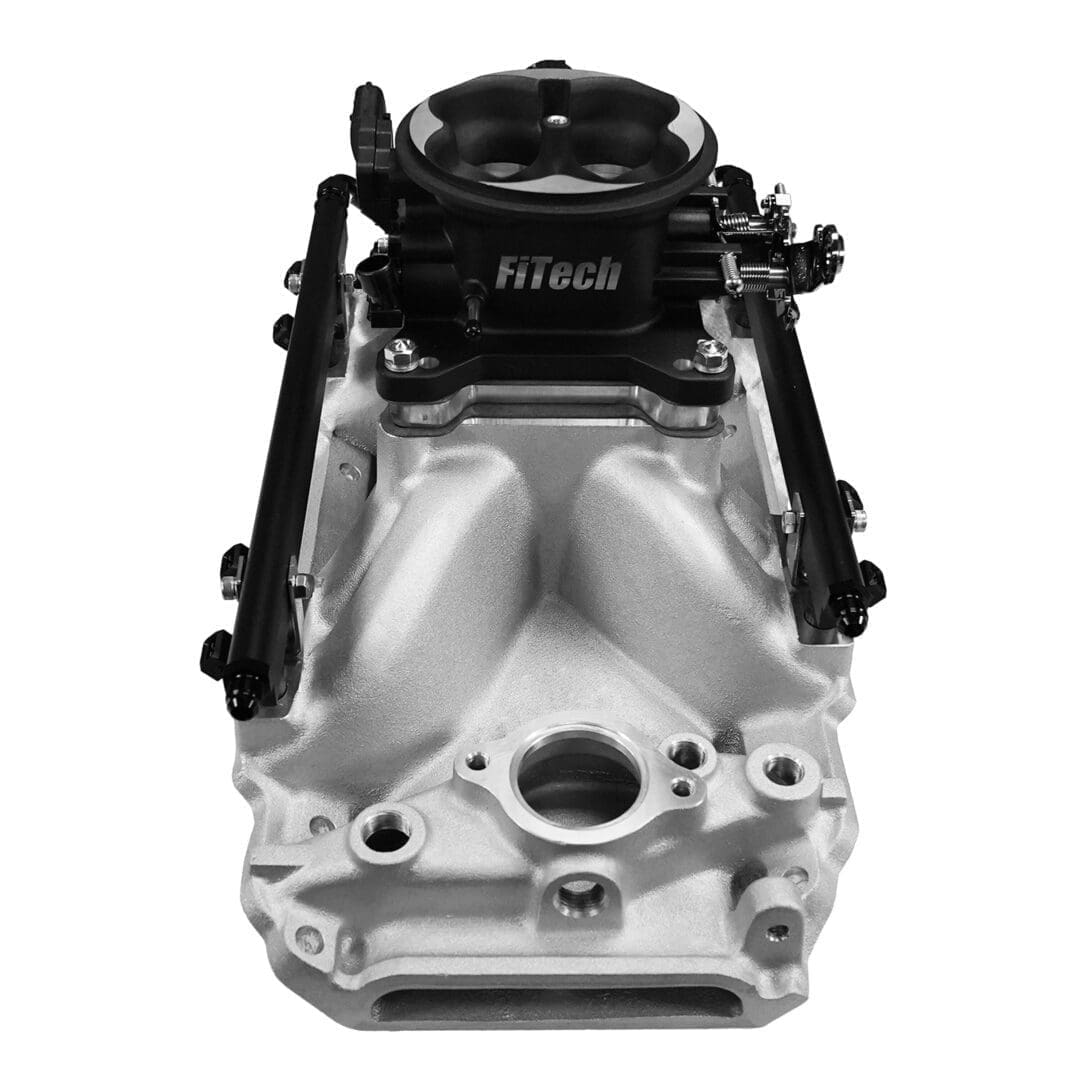 FiTech intake manifold on white background.