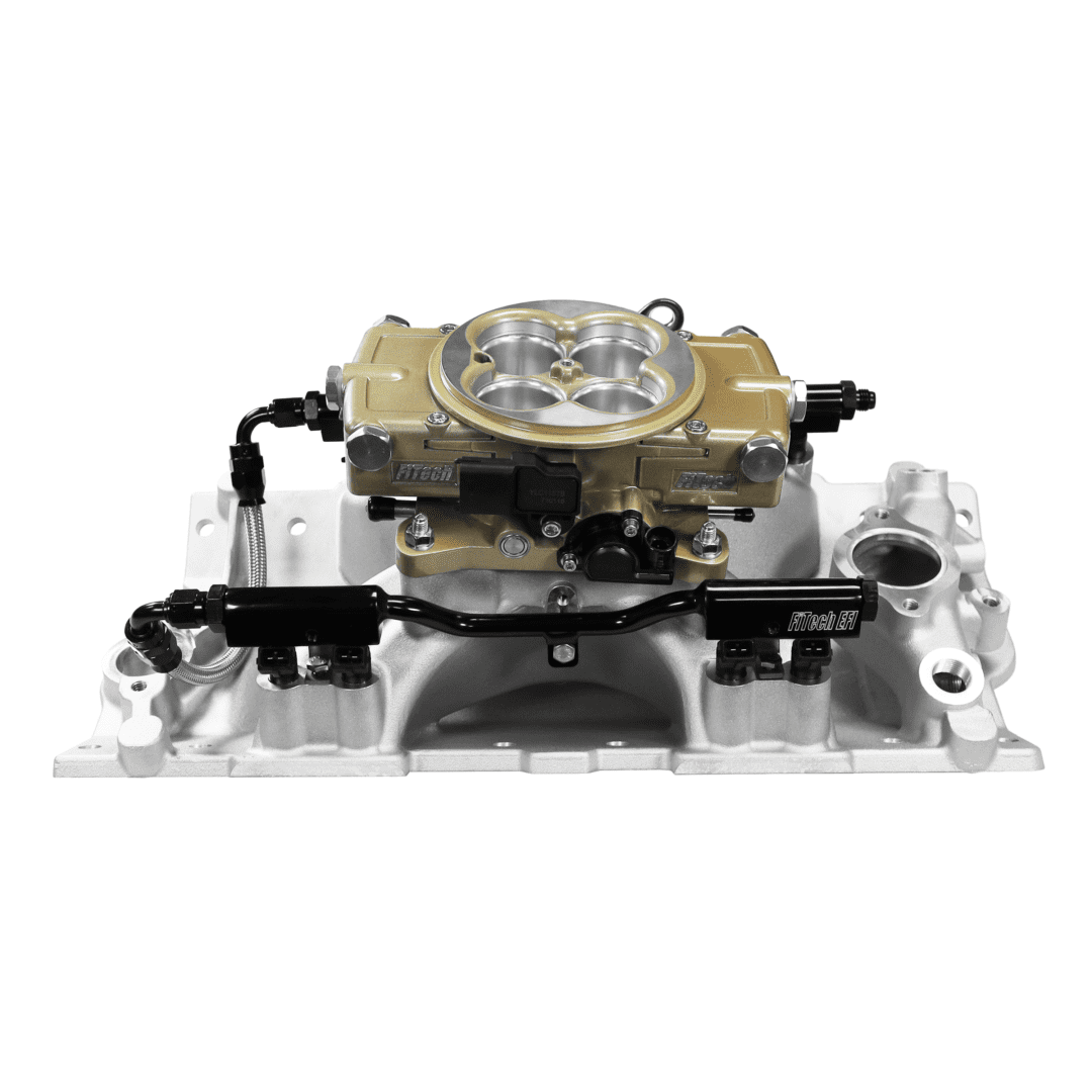 Carburetor assembly on intake manifold.