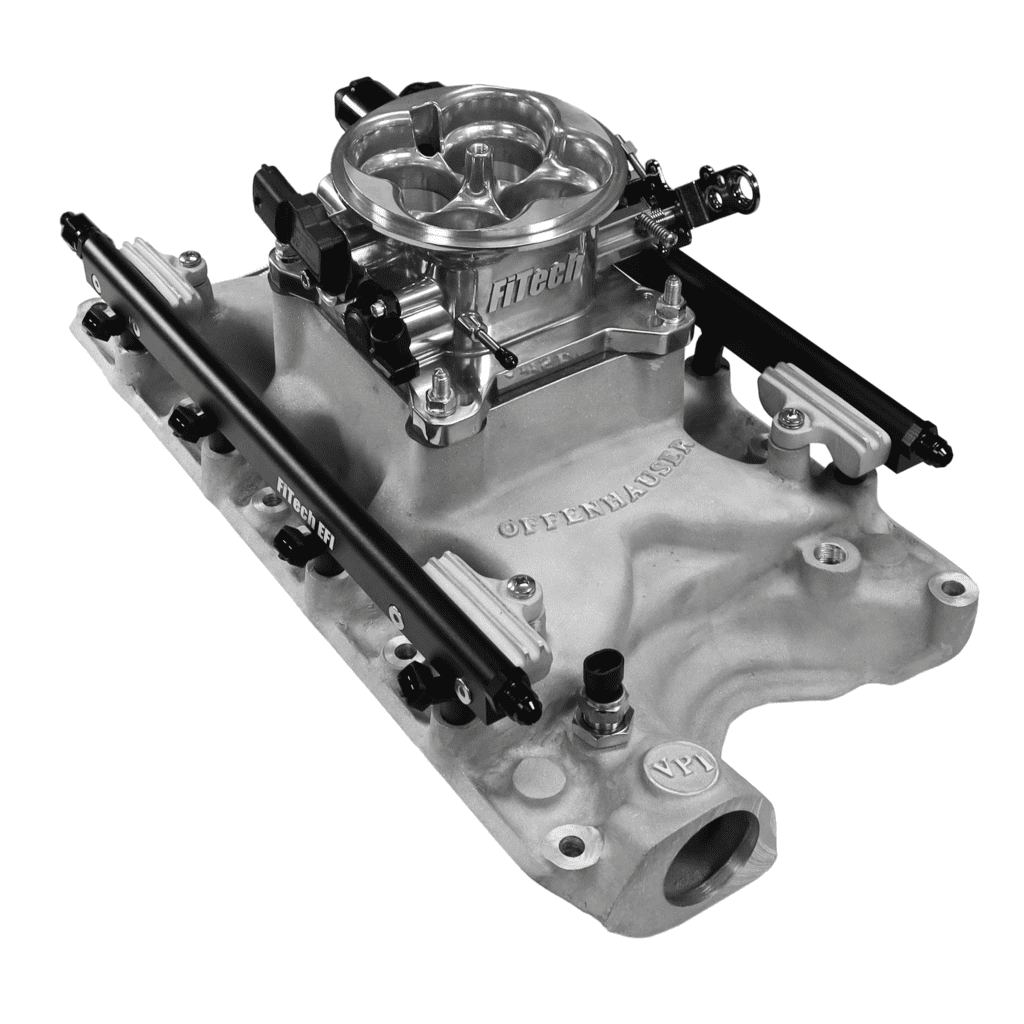 Carburetor on engine intake manifold assembly.