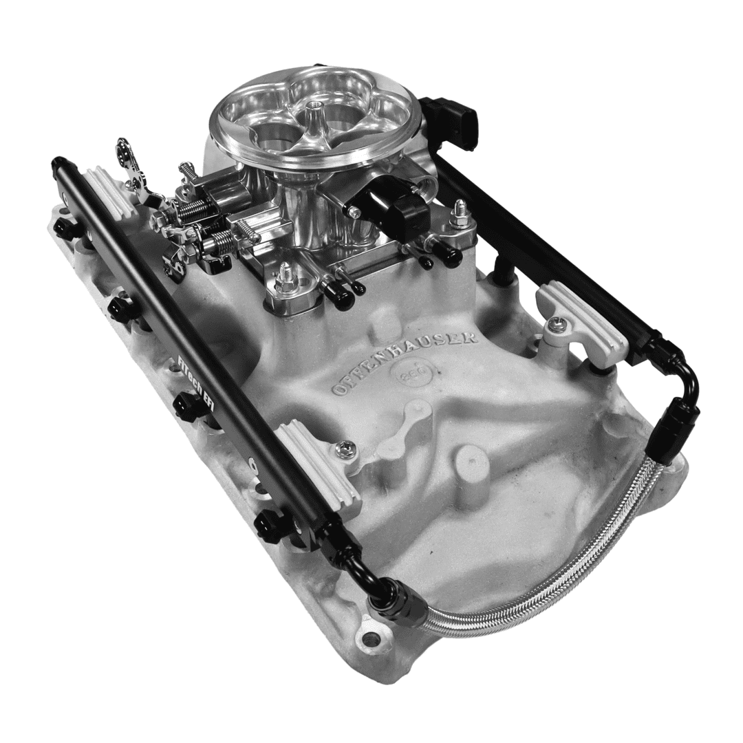 Car engine intake manifold with carburetor.