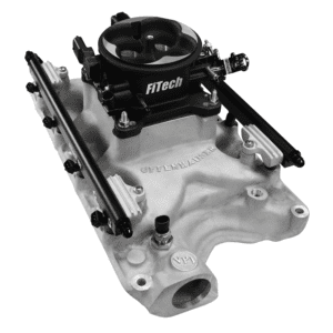 FiTech carburetor on automotive intake manifold.