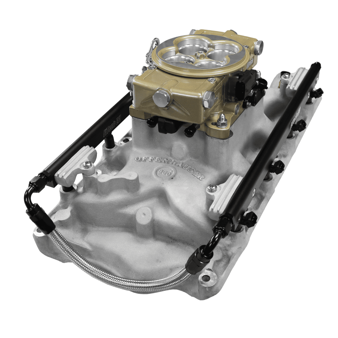 Engine intake manifold with carburetor.