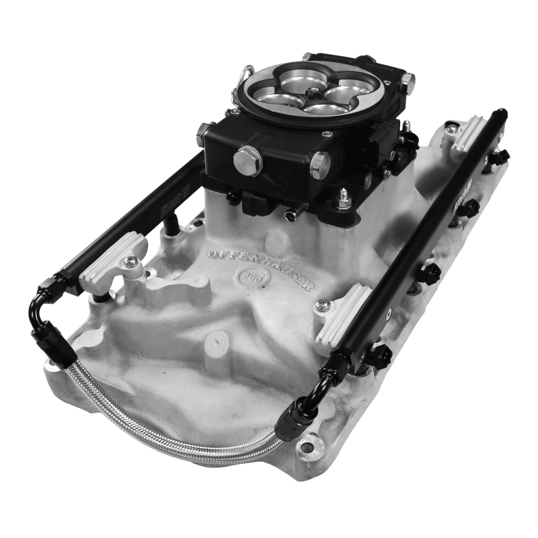 Car engine intake manifold with carburetor.