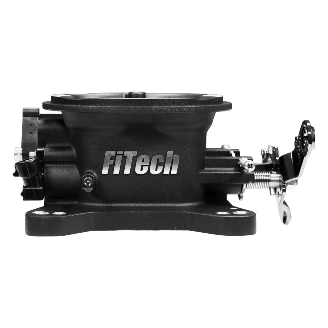 FiTech throttle body, automotive engine component.