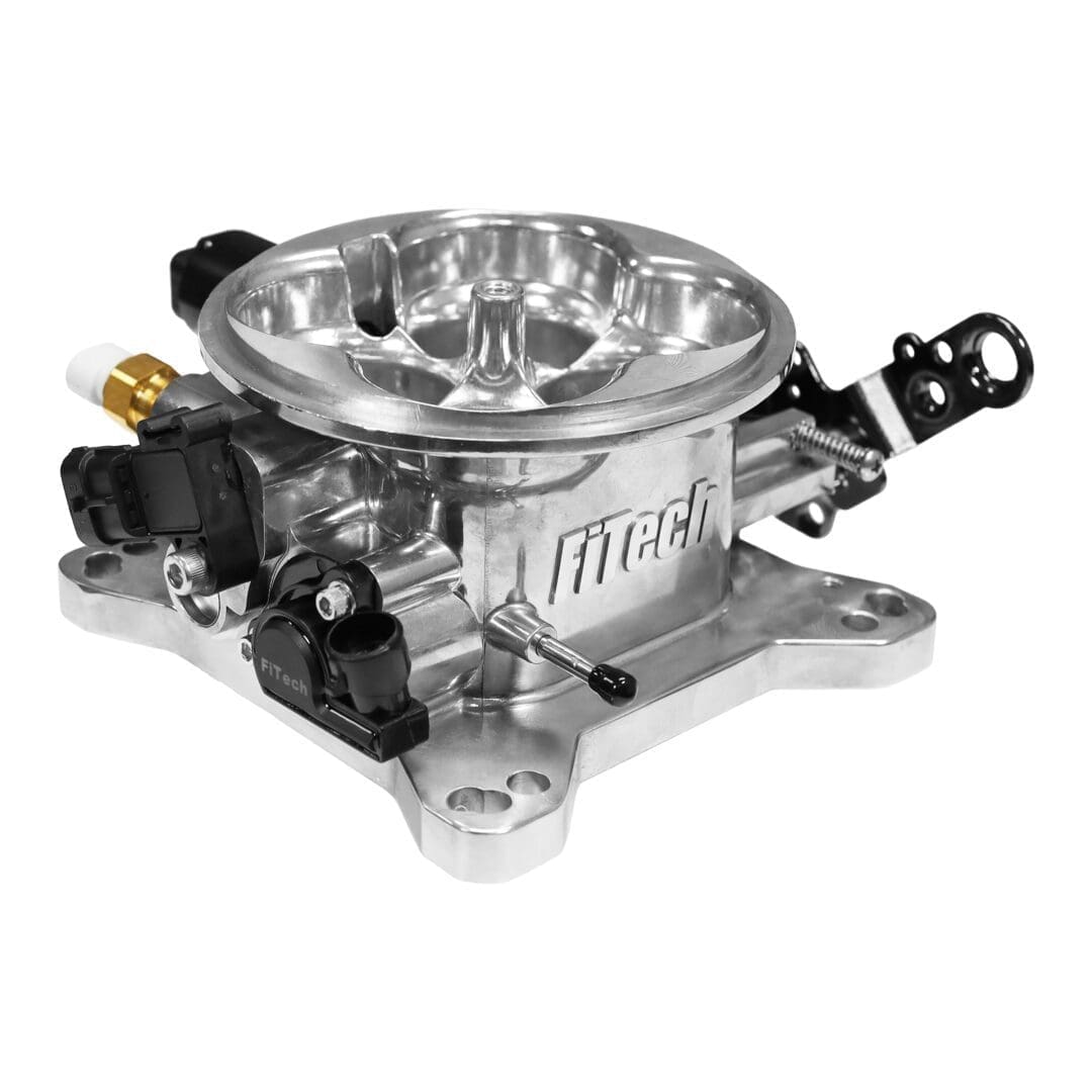 Silver automotive fuel injection throttle body.