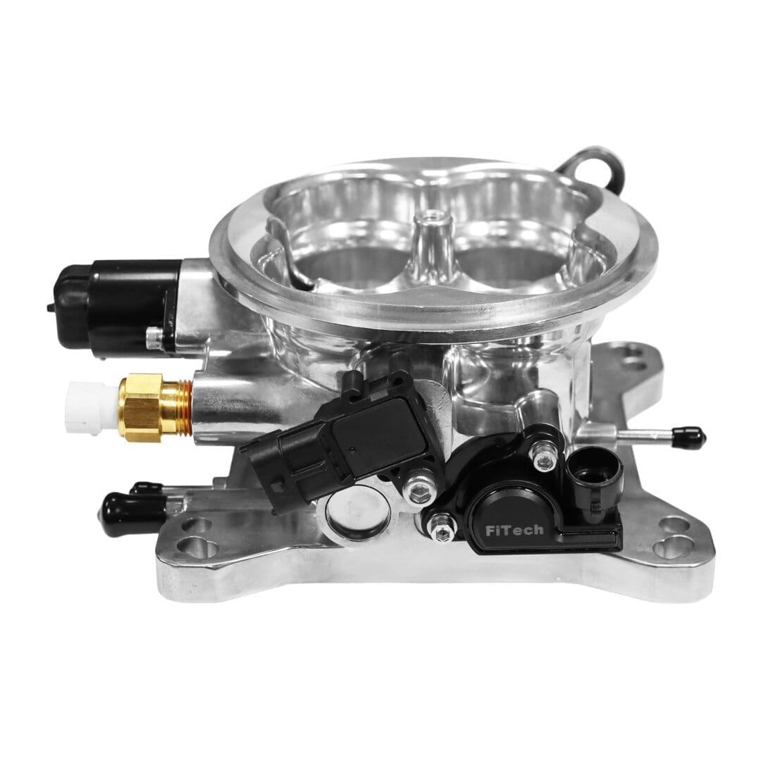 Carburetor with multiple components and connectors.