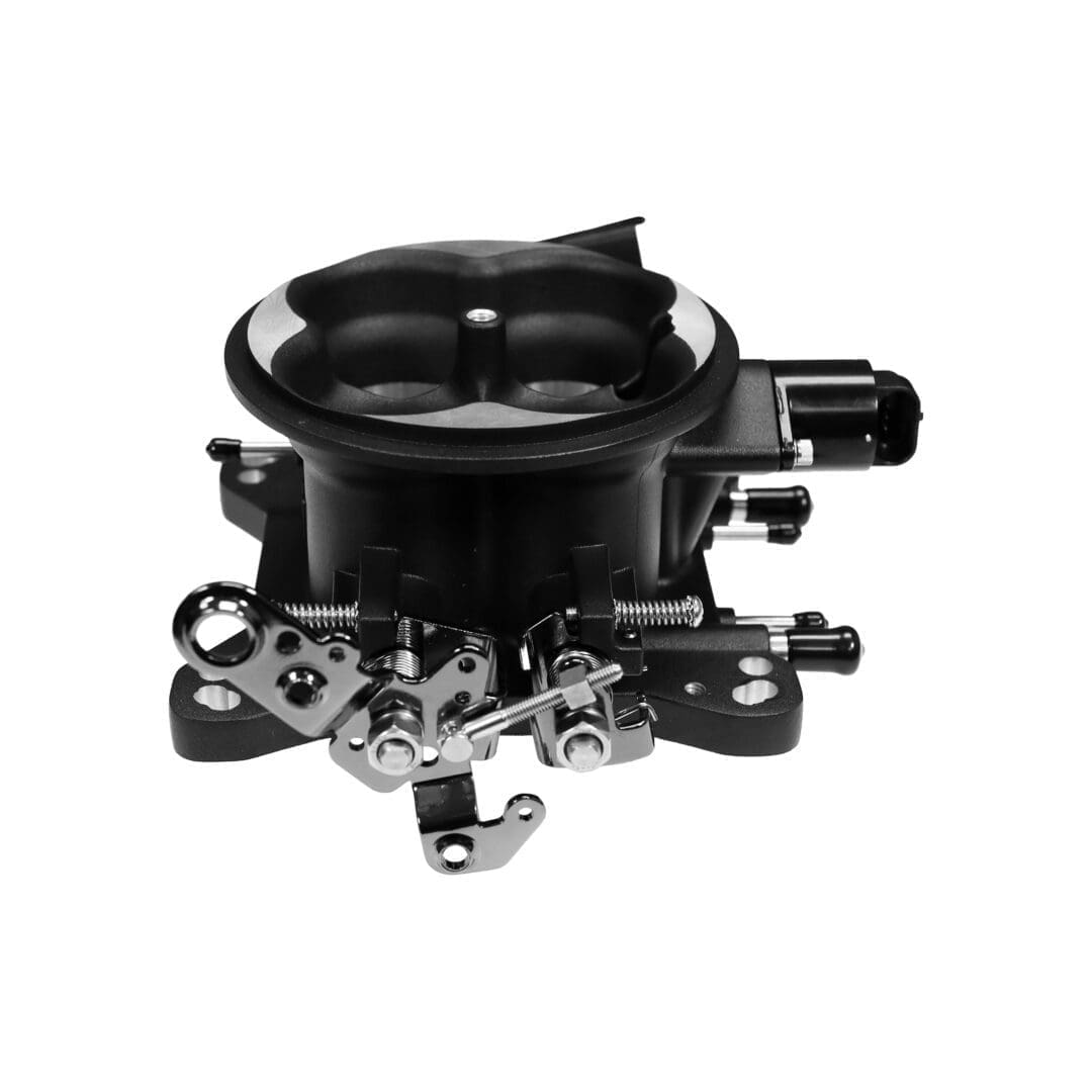Carburetor assembly on white background.
