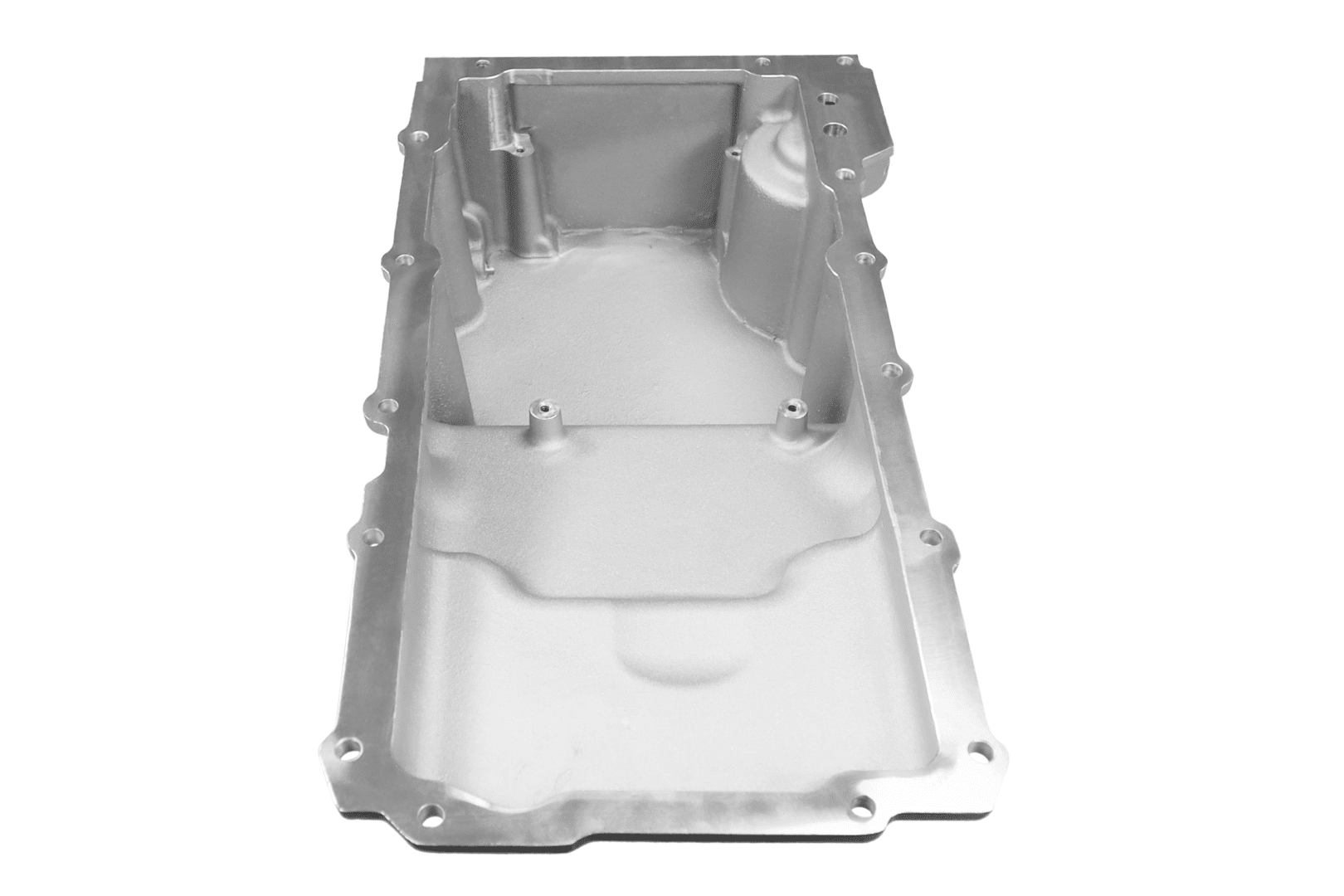 Metal engine oil pan on white background.