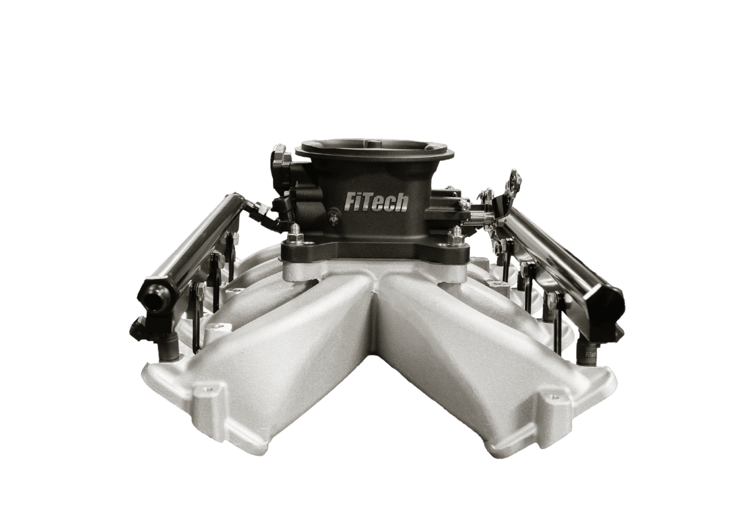 FiTech engine intake manifold on black background.