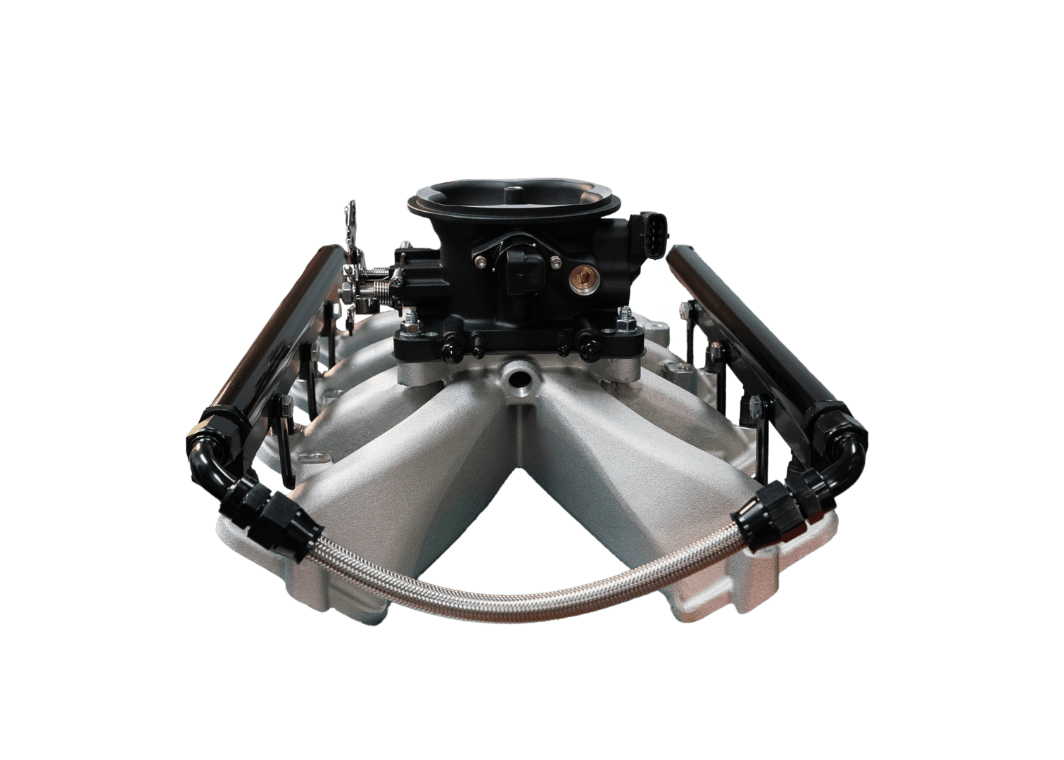 Car engine intake manifold on black background.