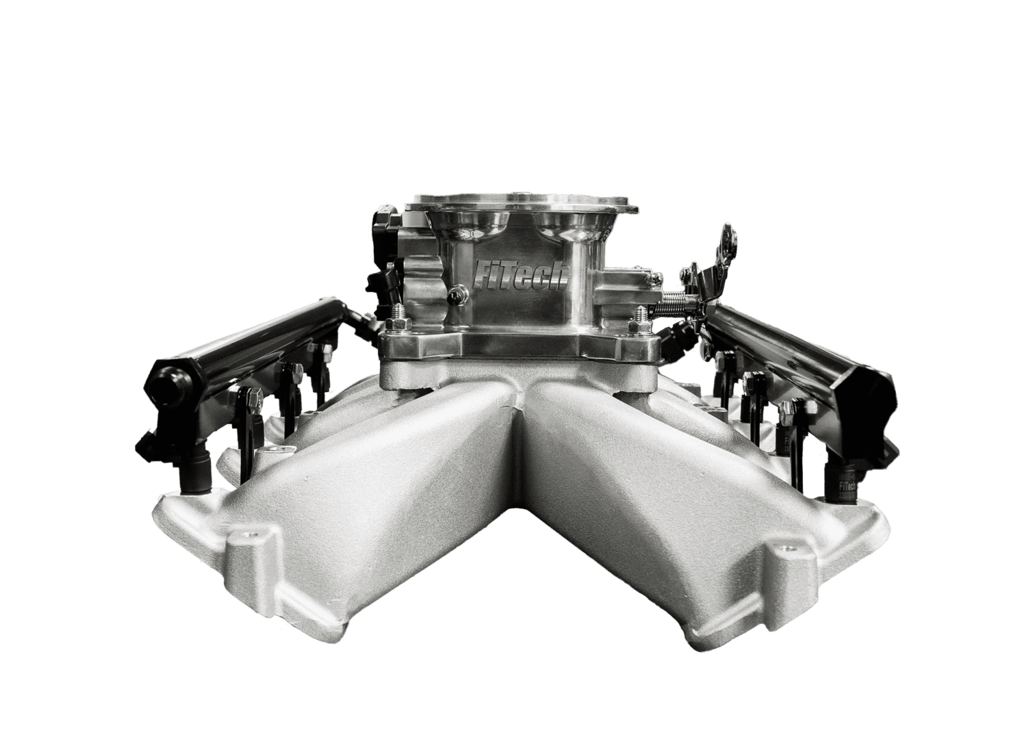 Engine intake manifold on black background.