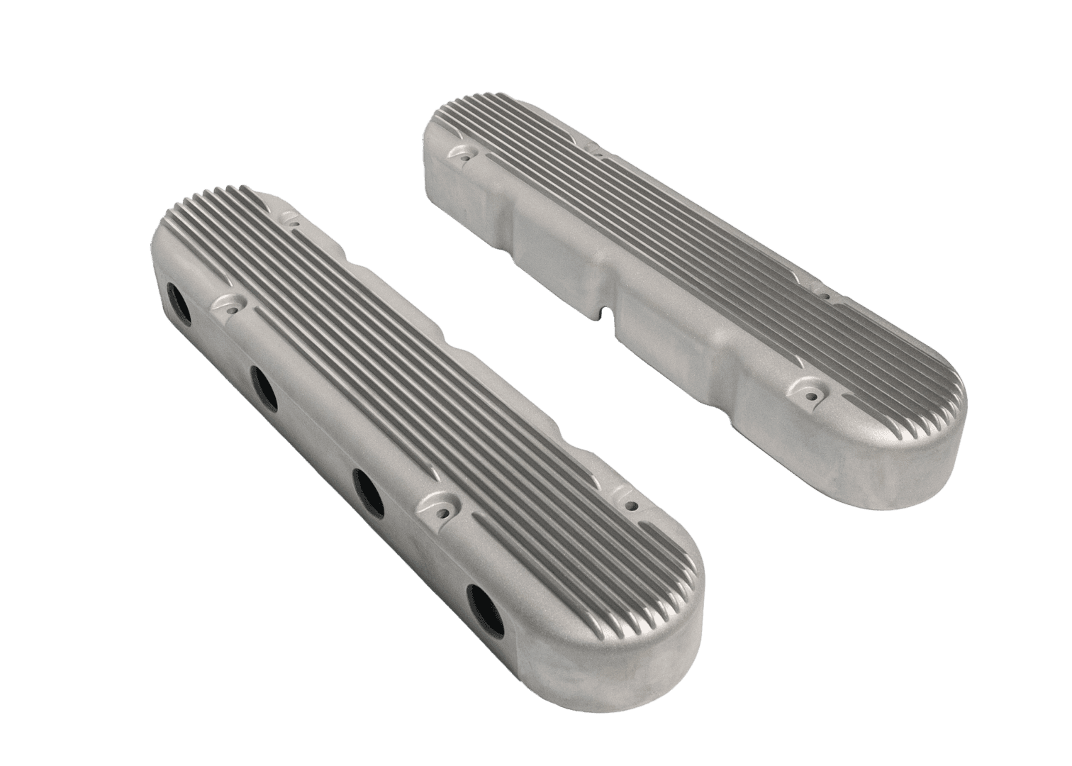 Aluminum engine valve covers on black background.