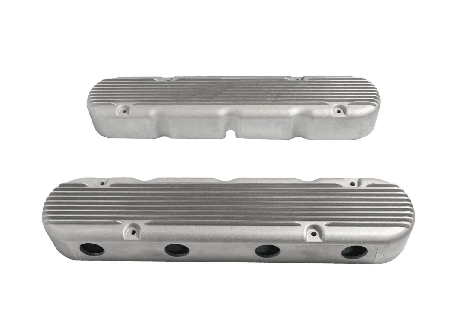 Two silver ribbed engine valve covers.