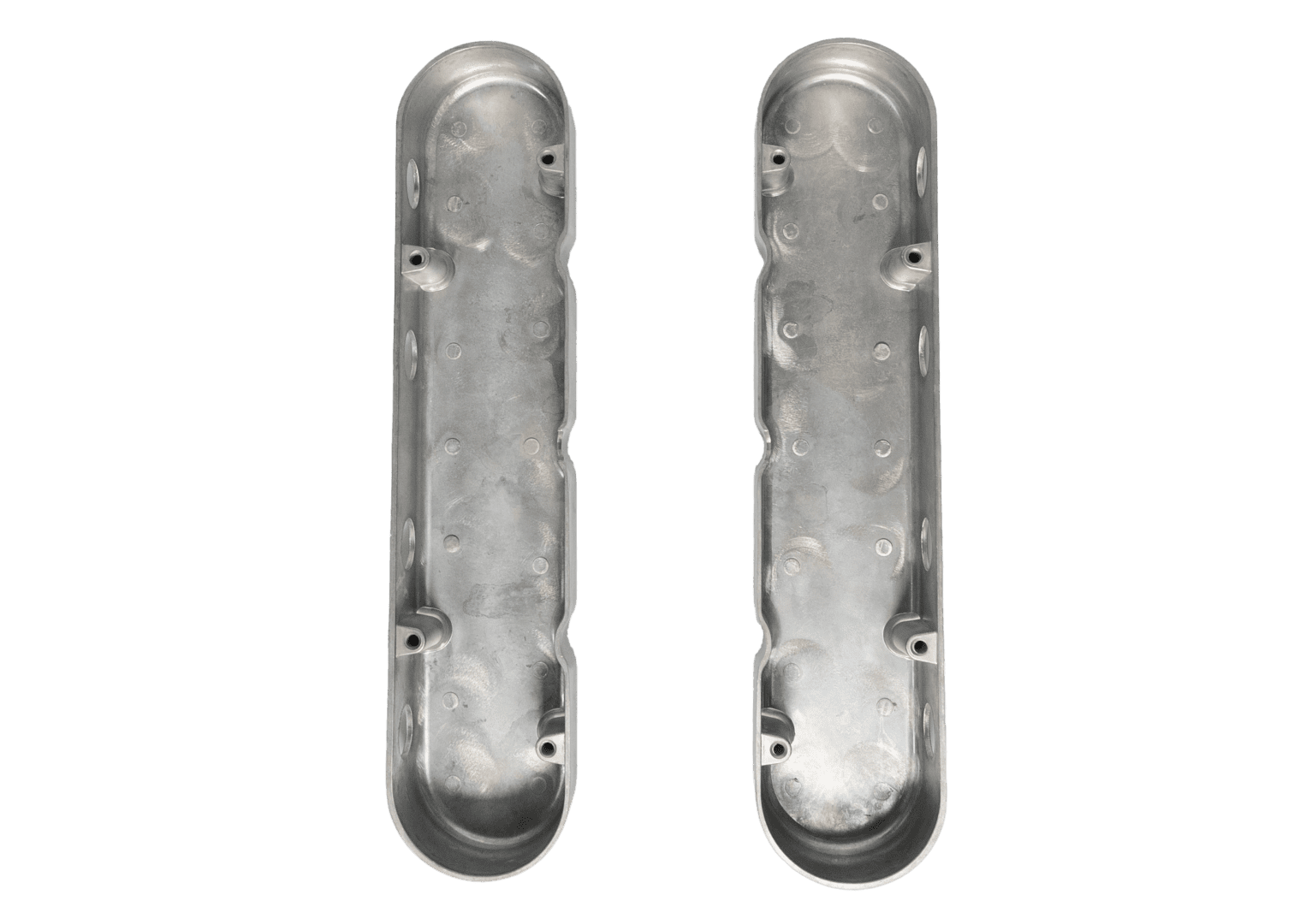 Two silver metal components on black background.