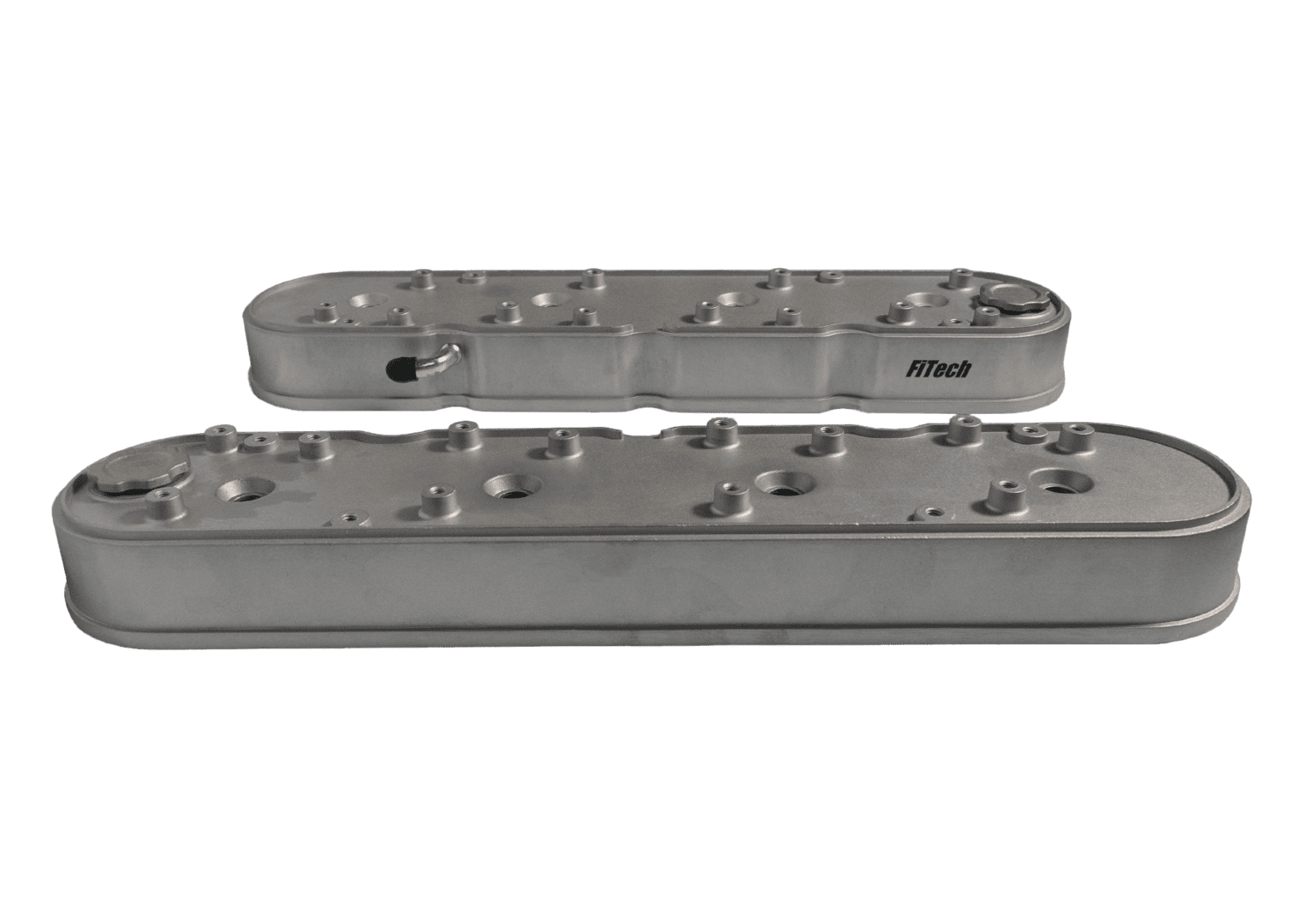Two silver engine valve covers, black background.
