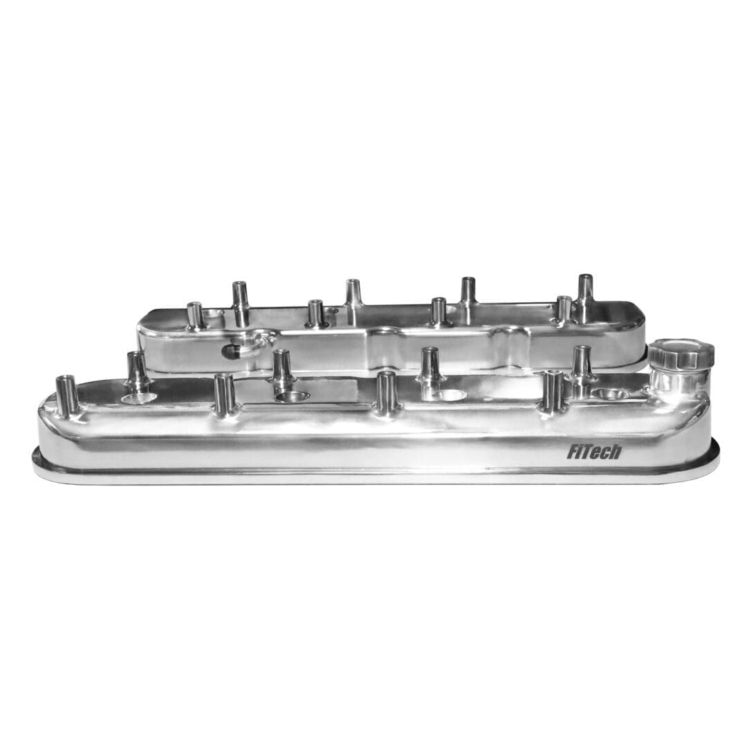 Chrome engine valve covers, isolated on white.