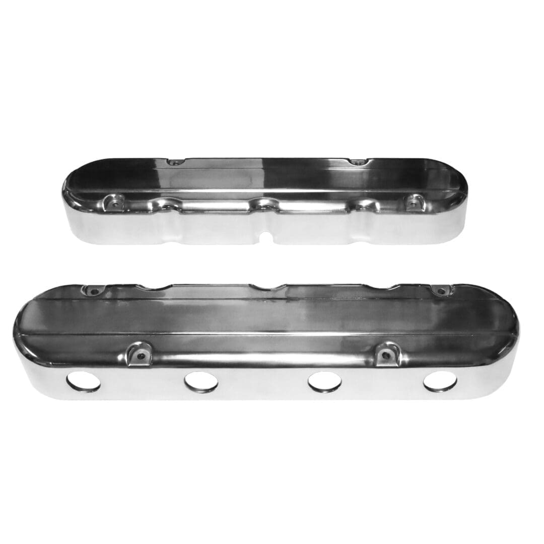 Chrome engine valve covers, white background.