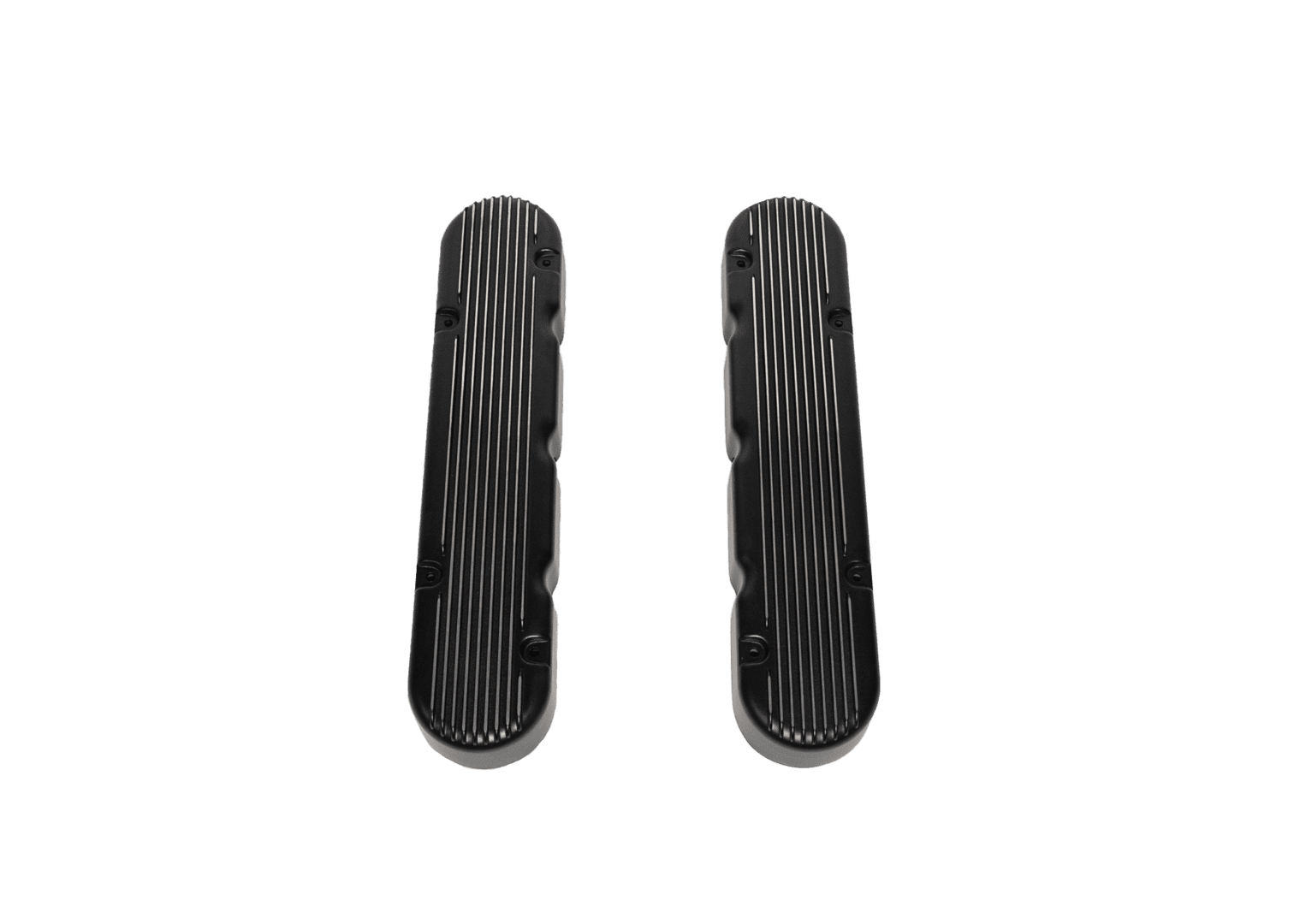 Two black ribbed engine valve covers.