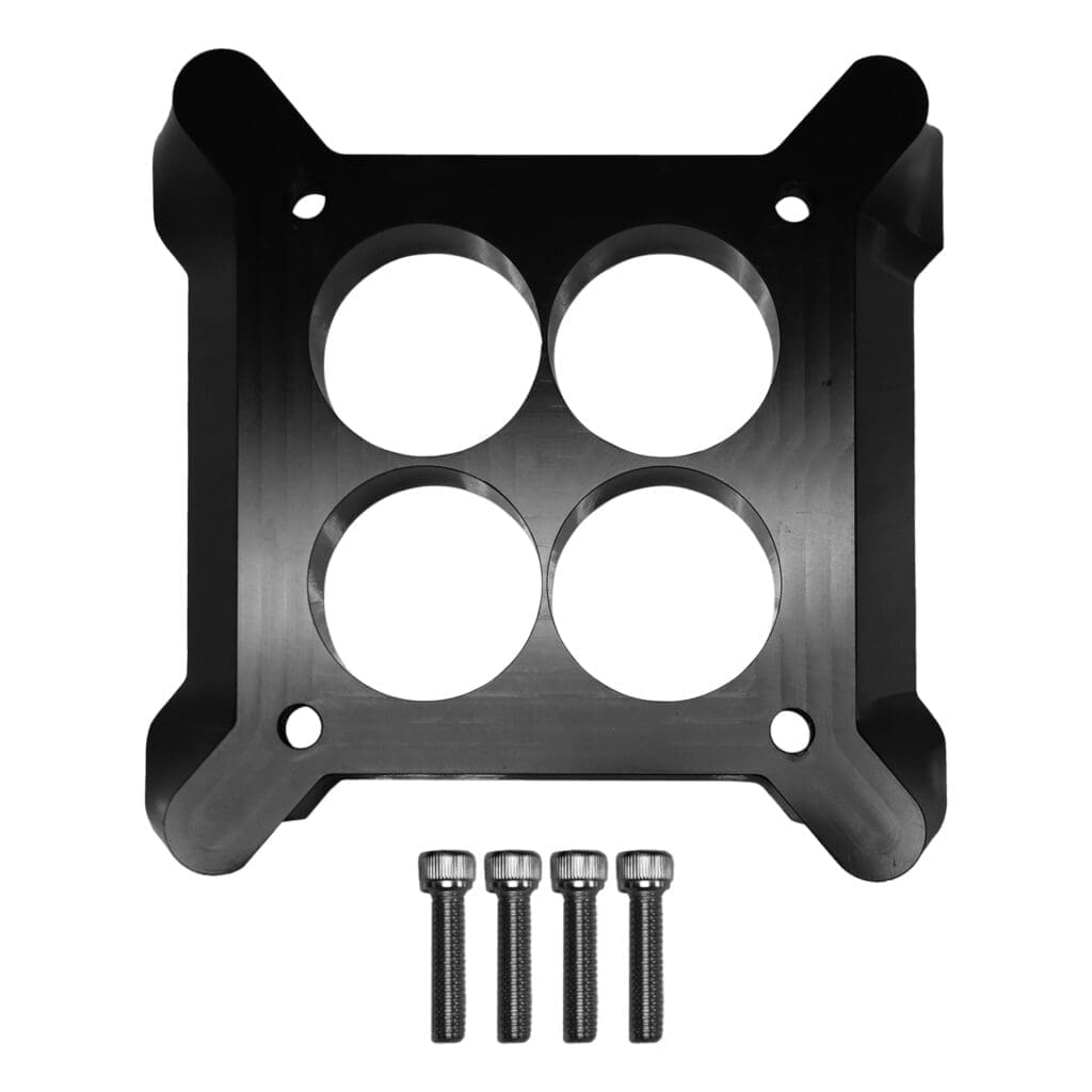 Carburetor spacer with four bolts displayed.
