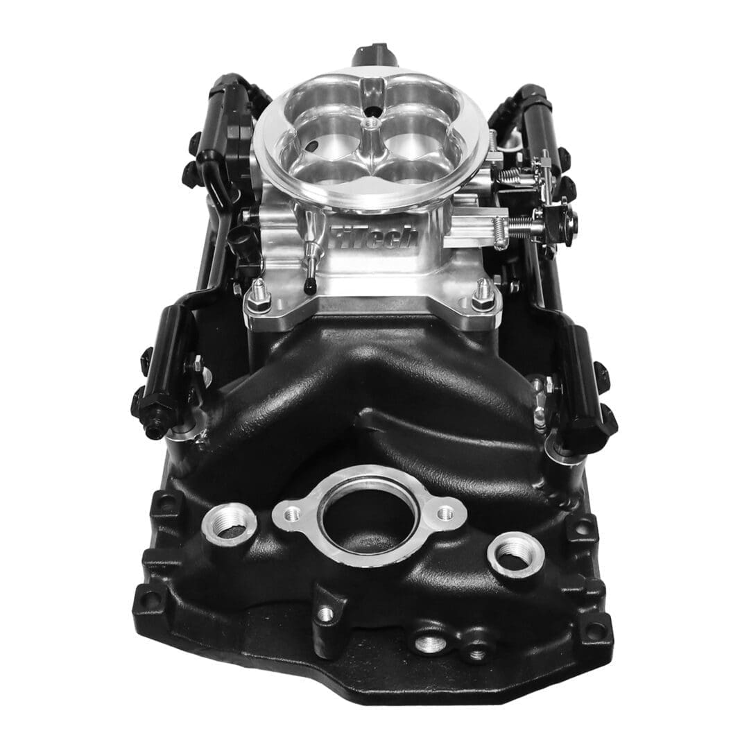Engine intake manifold, black and metallic.