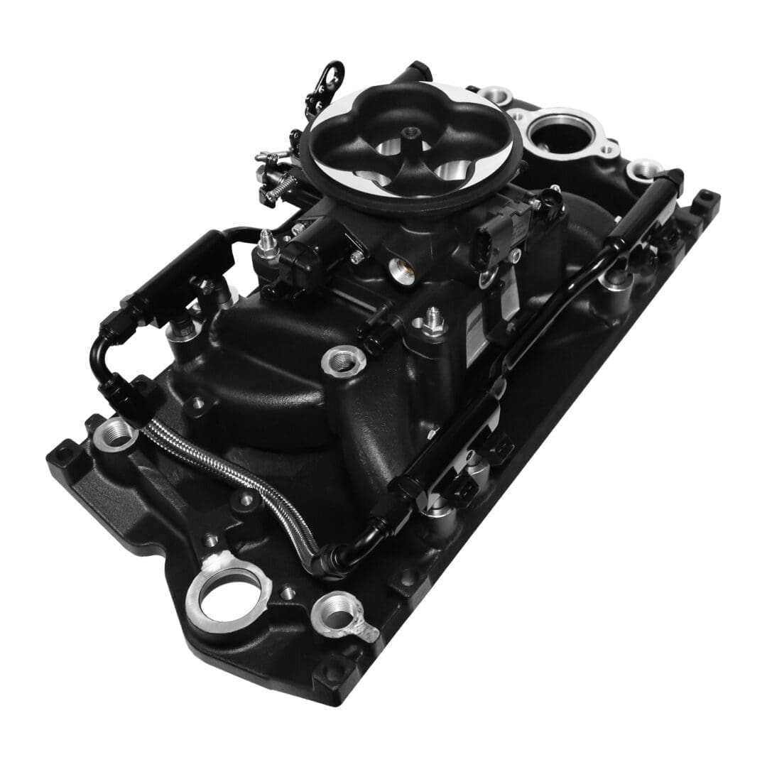 Black automotive engine intake manifold assembly.
