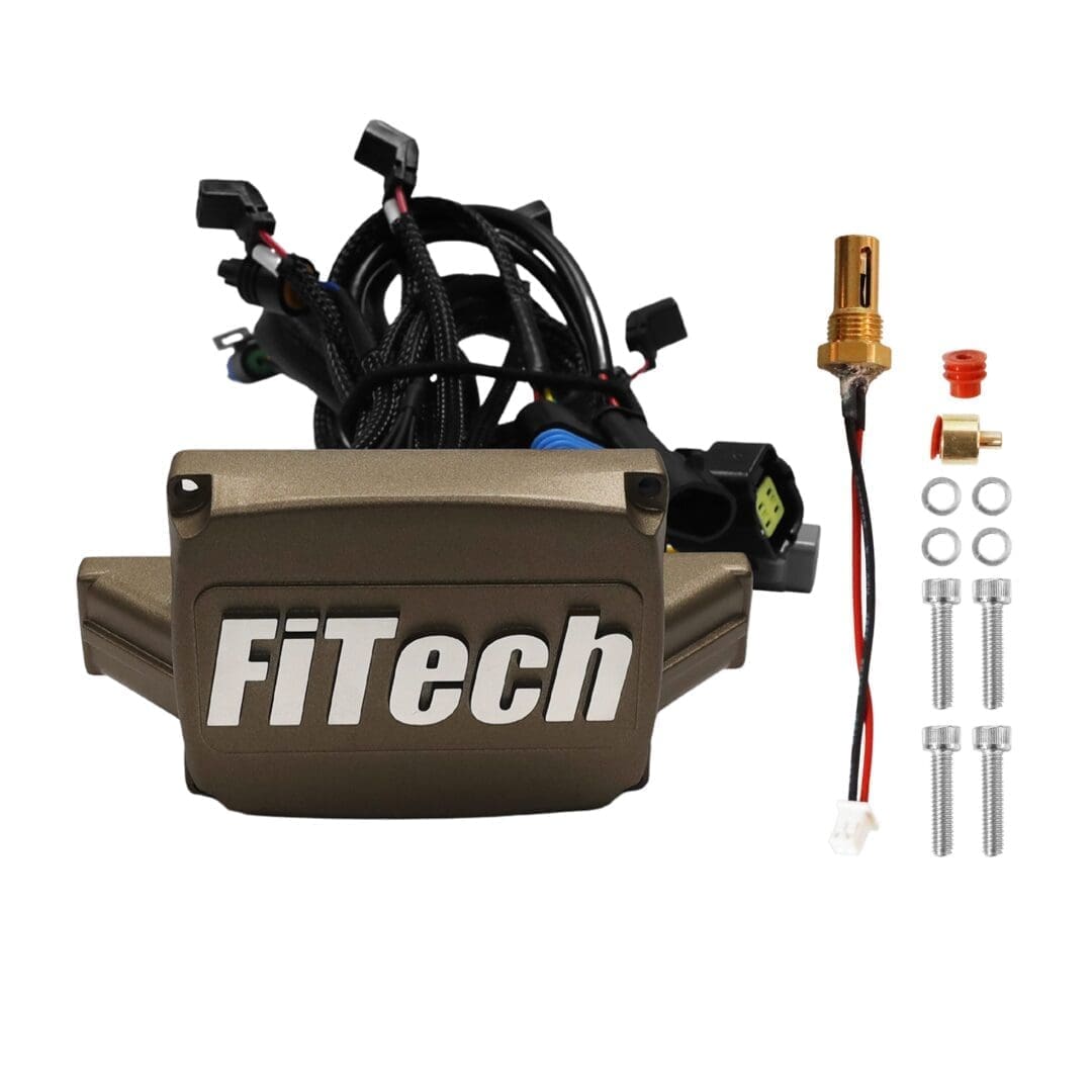 FiTech car engine components and wiring.