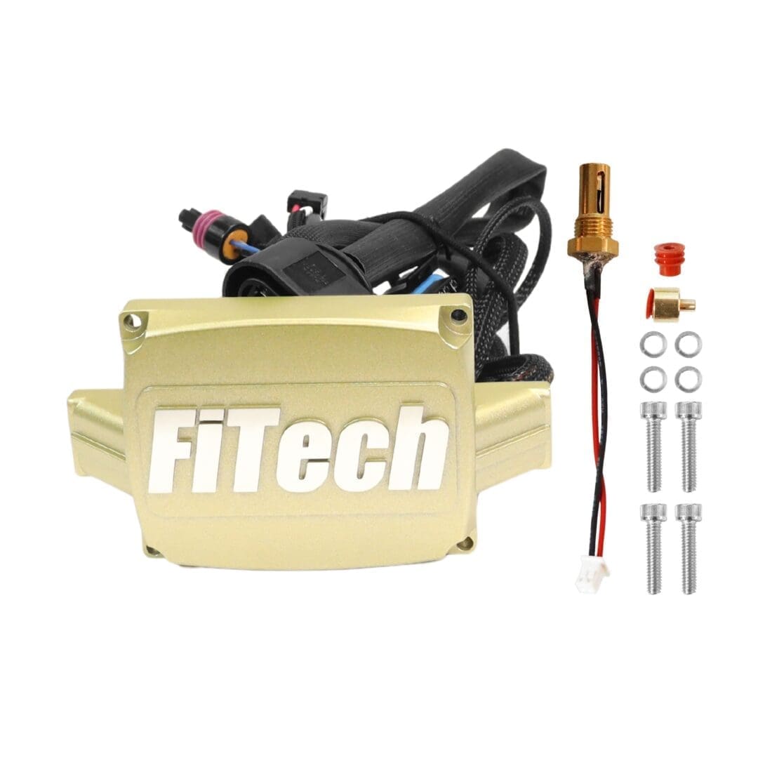 FiTech automotive component with wiring and accessories.