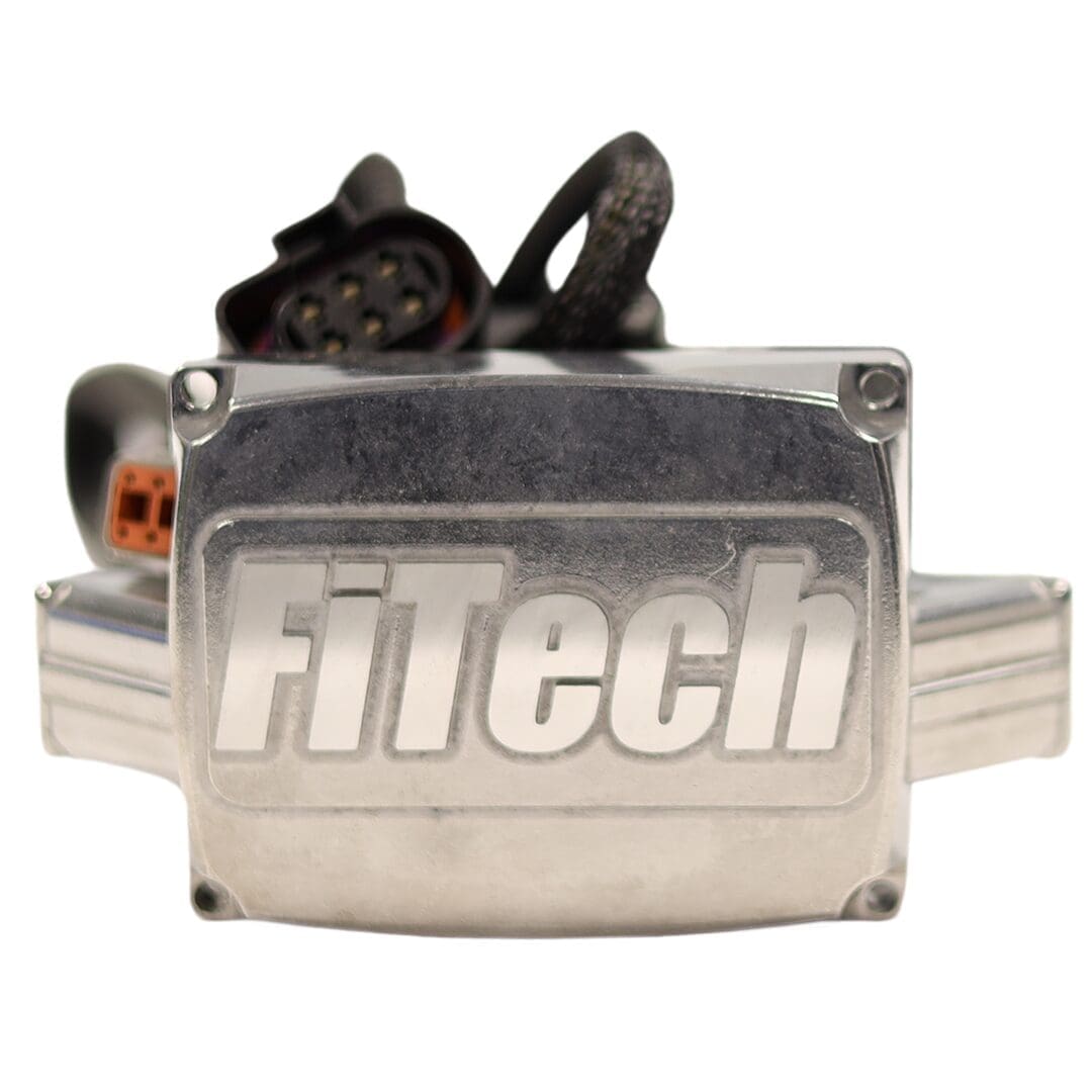 FiTech automotive component with wiring connectors.